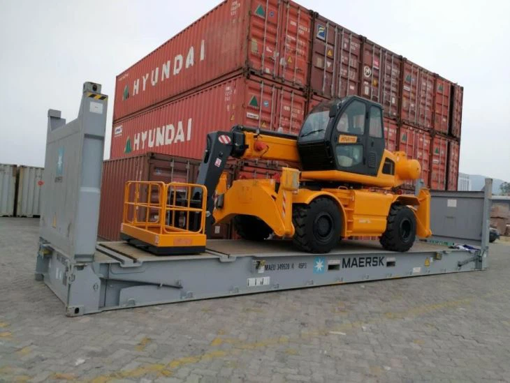 rotated telehandler on flat rack
